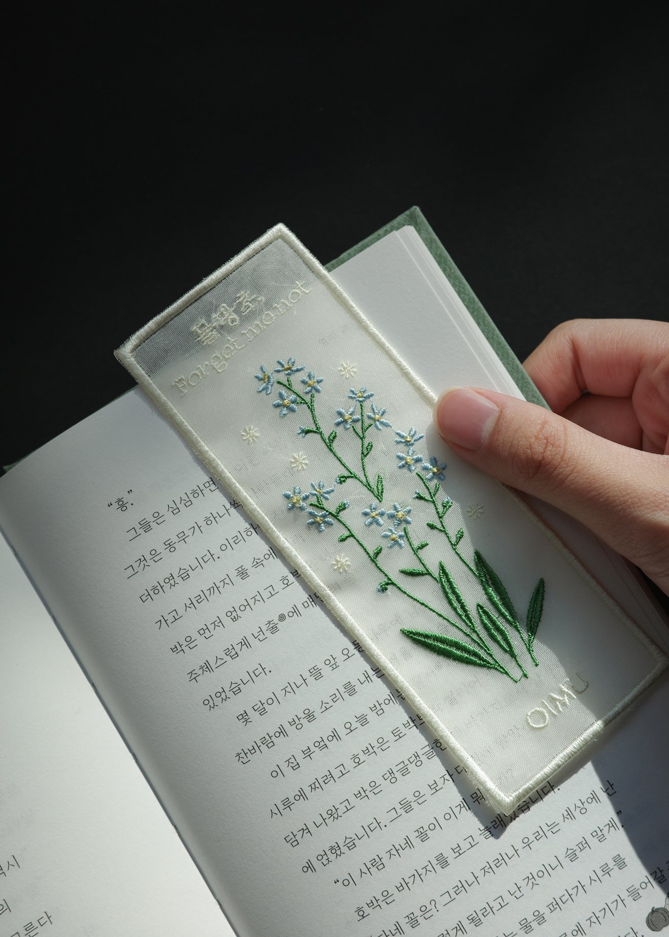 Plant Collecting Bookmark in Forget Me Not