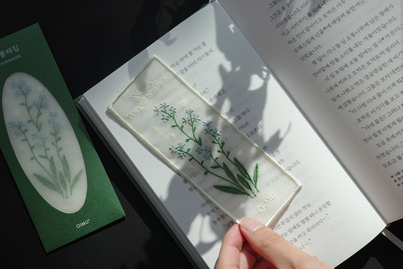 Plant Collecting Bookmark in Forget Me Not