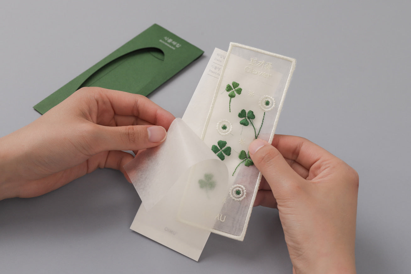 Plant Collecting Bookmark in Clover