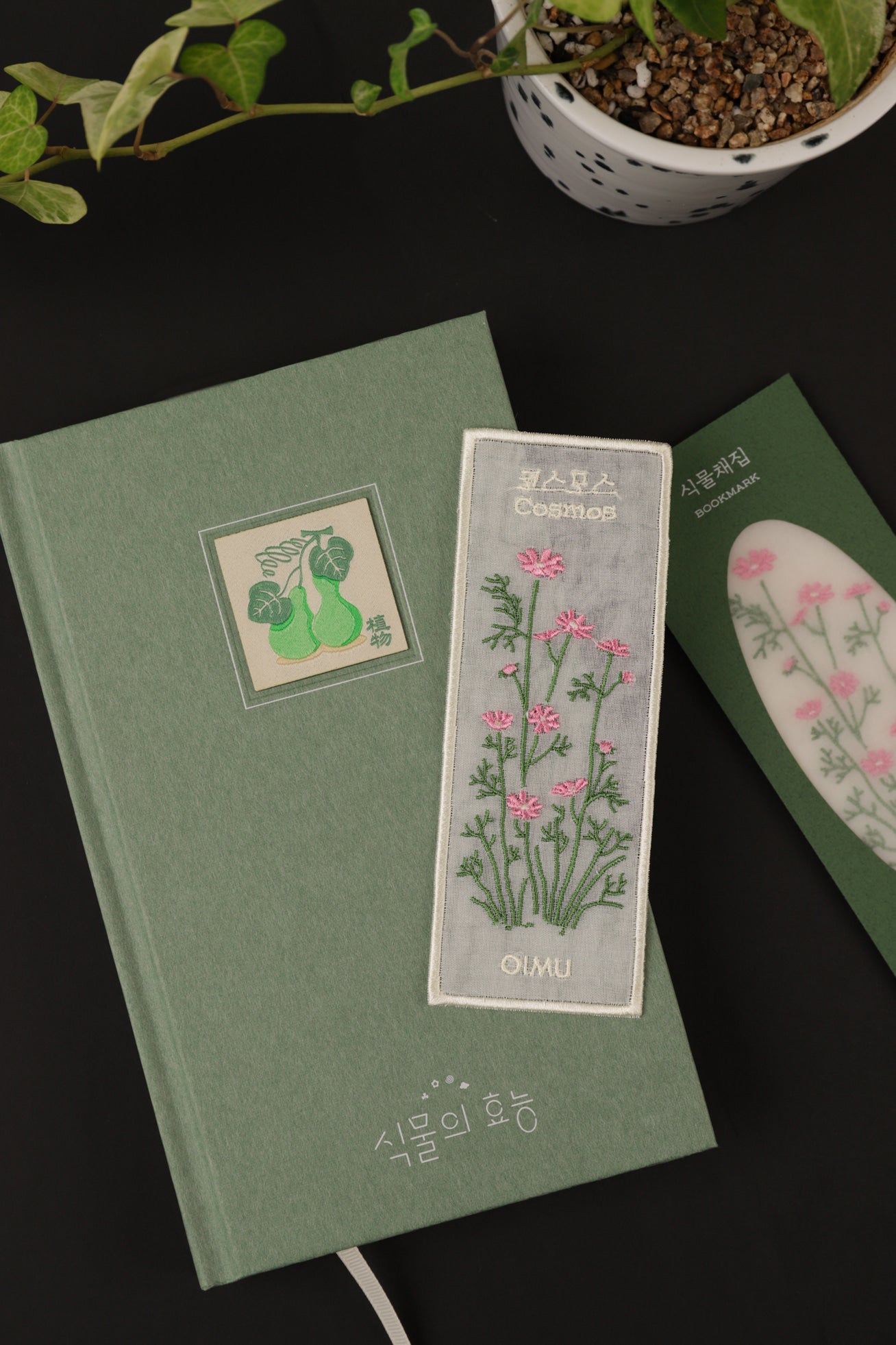 Plant Collecting Bookmark in Cosmos