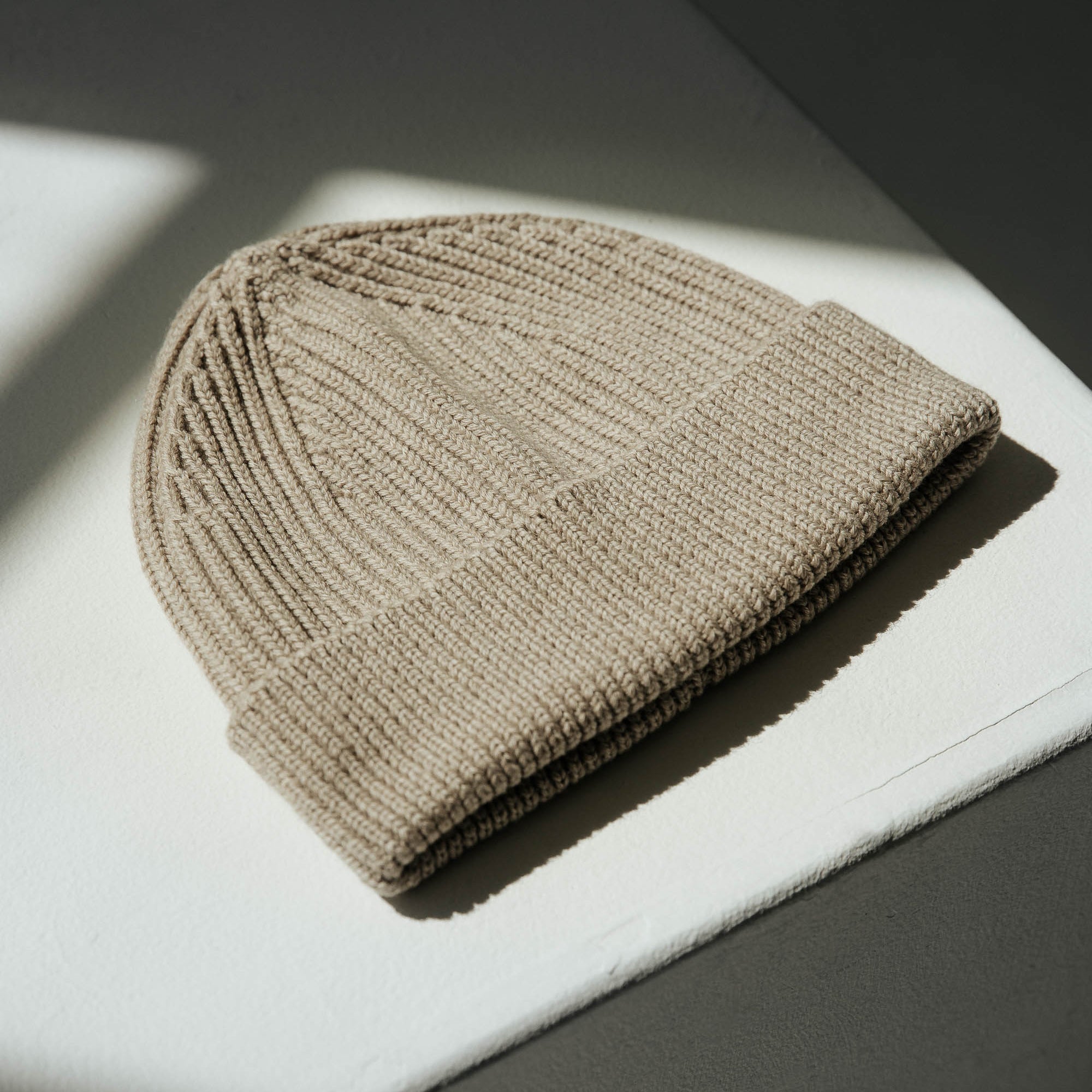 TUNØ Knitted Beanie Hat in Sand